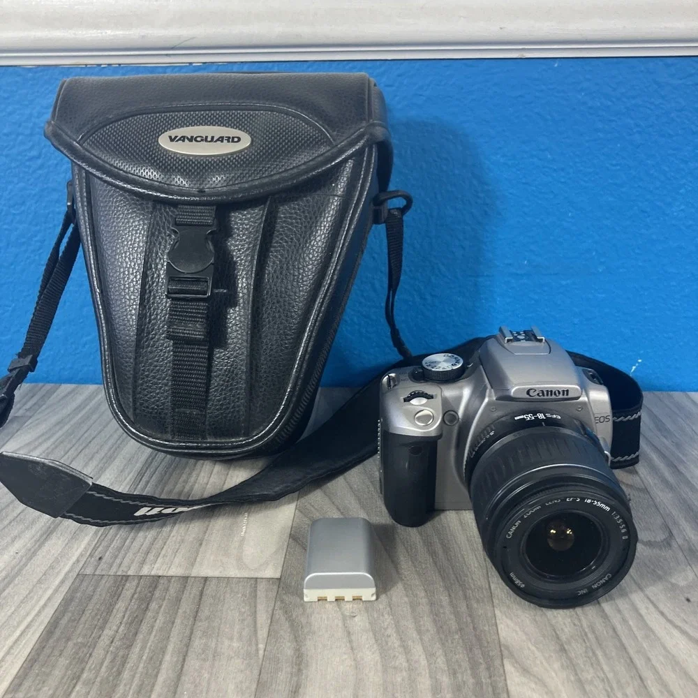 Canon EOS Digital Rebel DSLR Camera w/ EF-S 18-55mm Lens, Battery, Charger & Bag